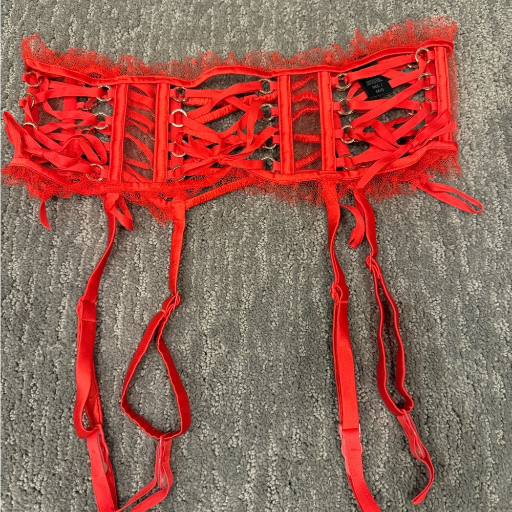 Designer collection by Victoria Secret garter belt. Size M/L 
NWOT